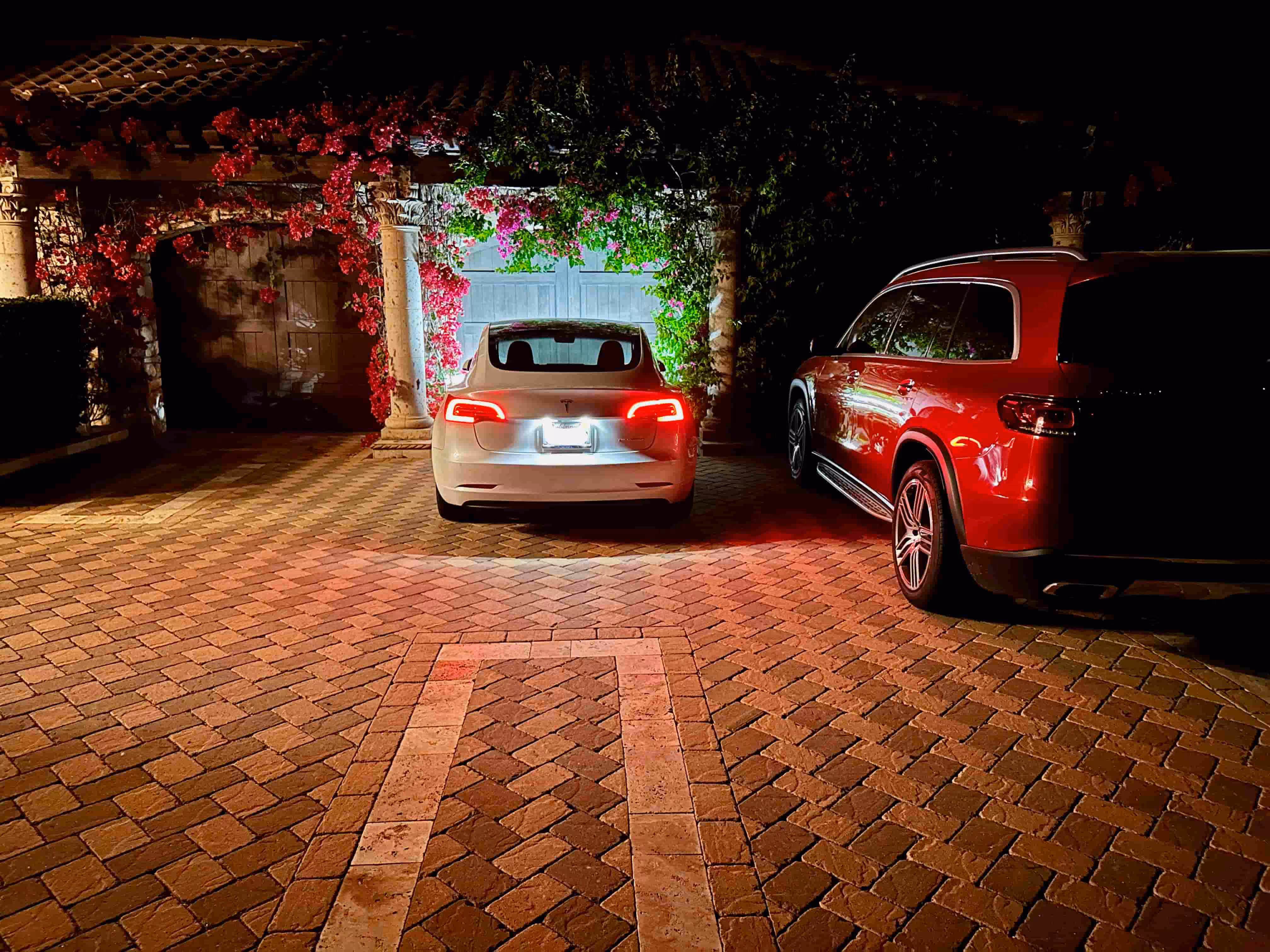 Two vehicles parked in driveway